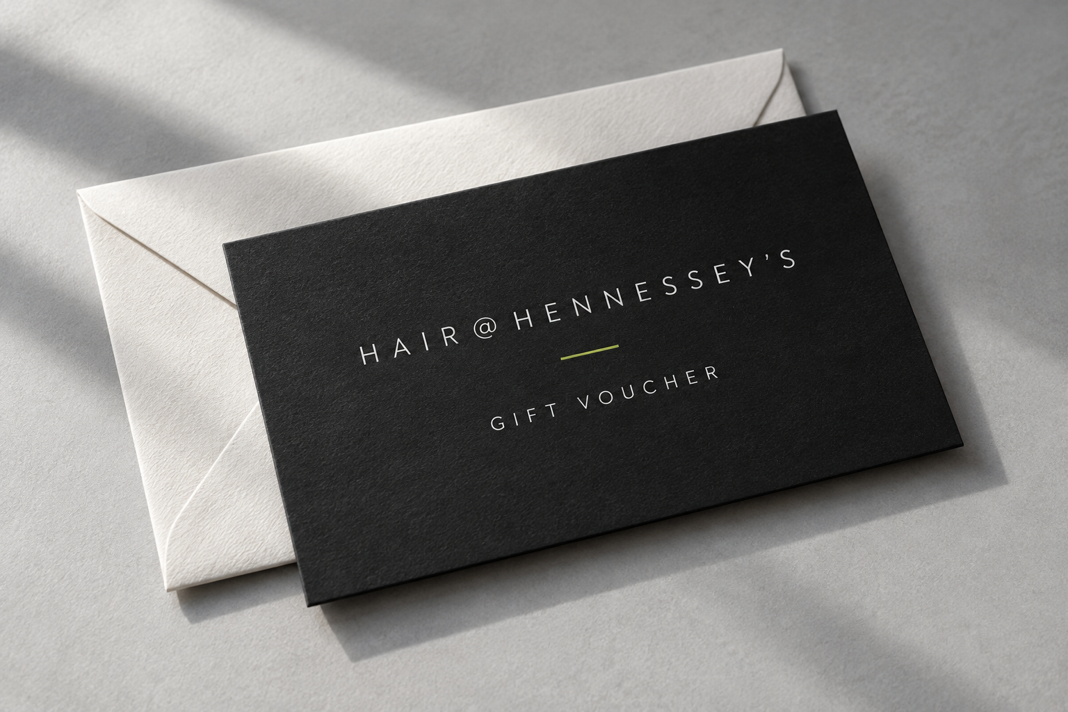 Hair at Hennessey's gift voucher design on a white envelope